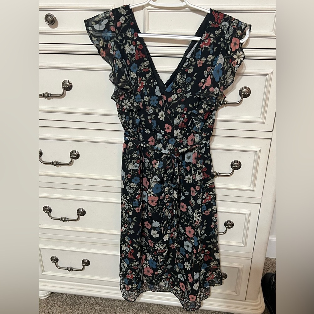 Black and floral maternity dress with pink and blue accents